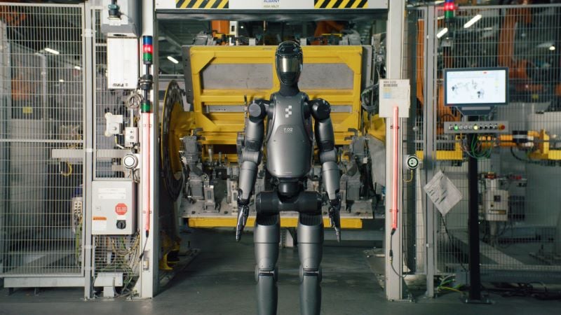 Figure 02 stands in front of a work area normally associated with human workers at BMW Group's Spartanburg, South Carolina plant