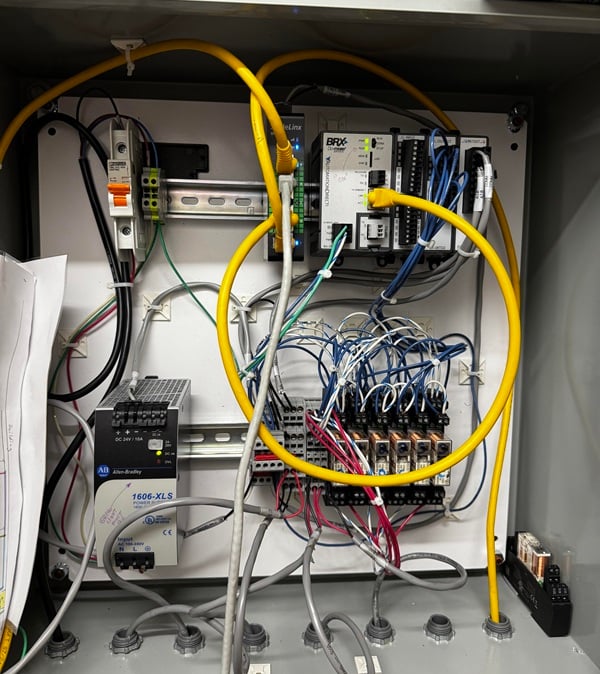 Figure 2. The compact AutomationDirect BRX PLC fits easily inside a small control enclosure, with Dold relays operating control valves.