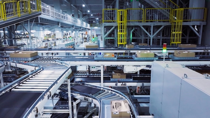 A conveyor system that uses AC motors with gearboxes.