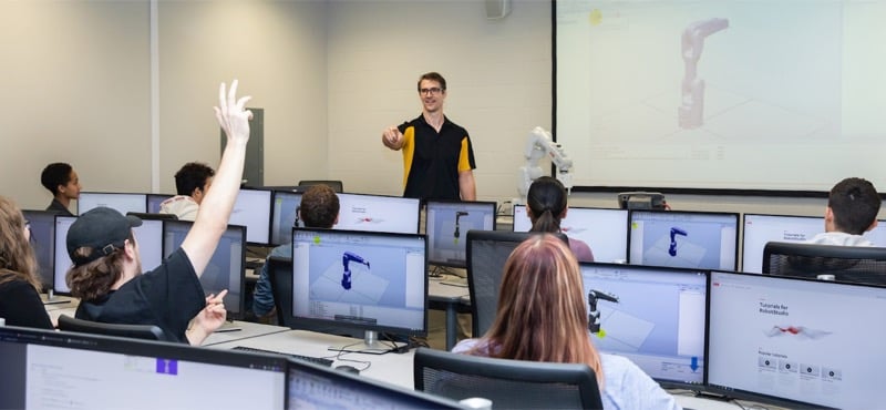 Students work through a RobotStudio Tutorial.