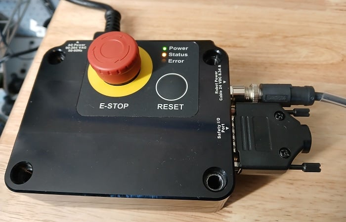  Figure 2. The power supply and safety I/O control box.