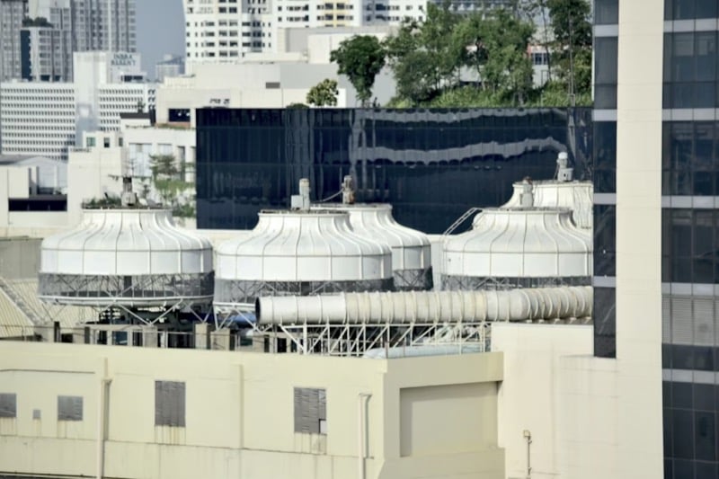 Roof-top air handling units with large cooling fans.