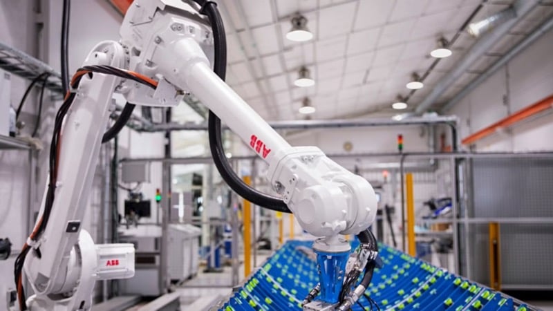 A robot performing work in a factory.
