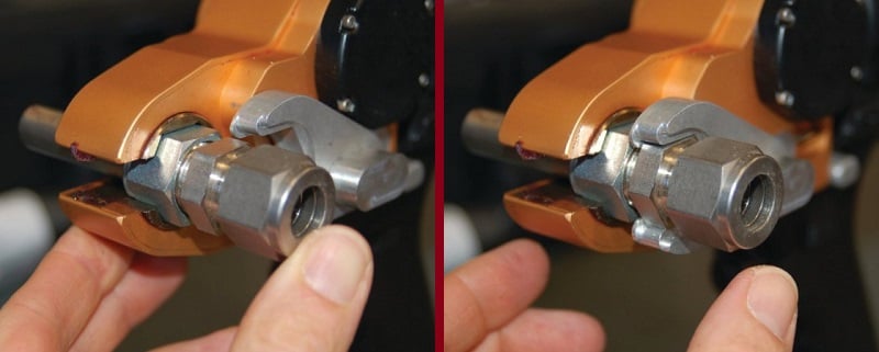Aeroswage SX-1 holding jig to engage the body of the tube fitting
