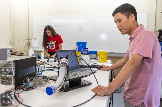 Students developing and testing new technology in UTulsa’s soft robotics laboratory.
